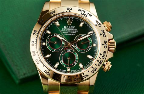 gold rolex green|Rolex gold watch green face.